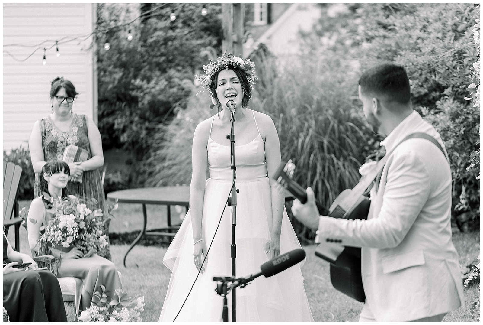 newlywed couple sing an emotional song during their intimate home wedding ceremony