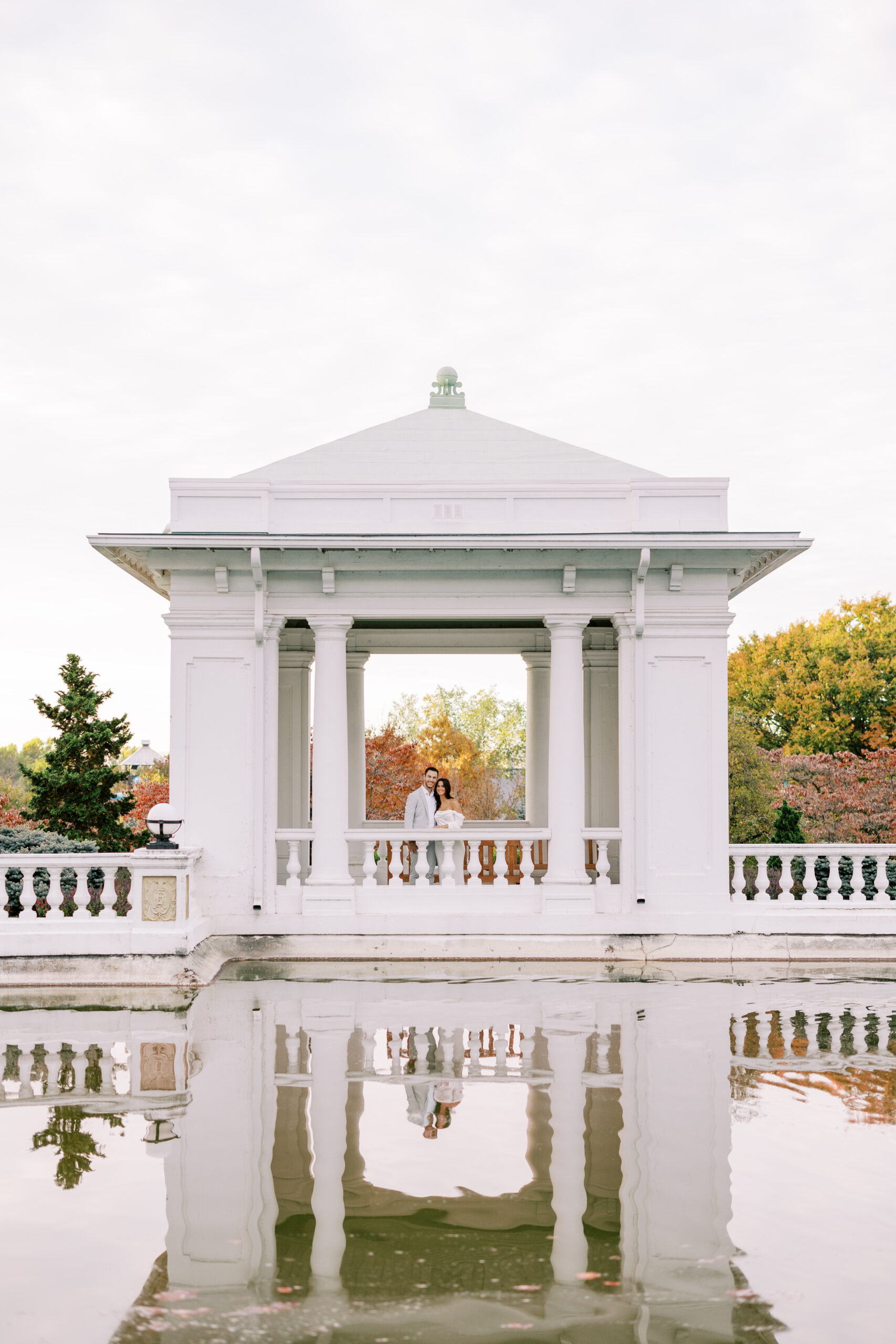 Hotel Hershey Engagement Photos, Reflection of couple standing at the Hotel Hershey